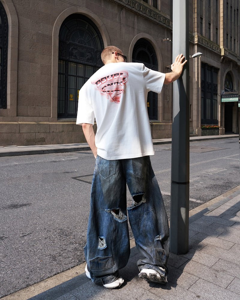 Reversed Waist Distressed Blade Jeans