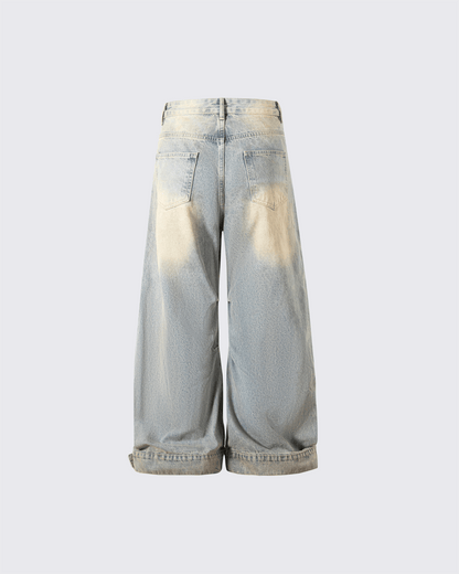 Wide-Leg Denim Jeans with Buttoned Hem