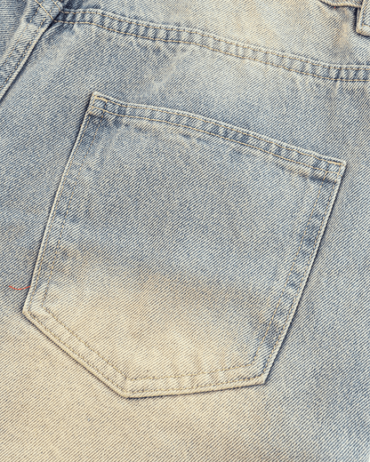 Wide-Leg Denim Jeans with Buttoned Hem