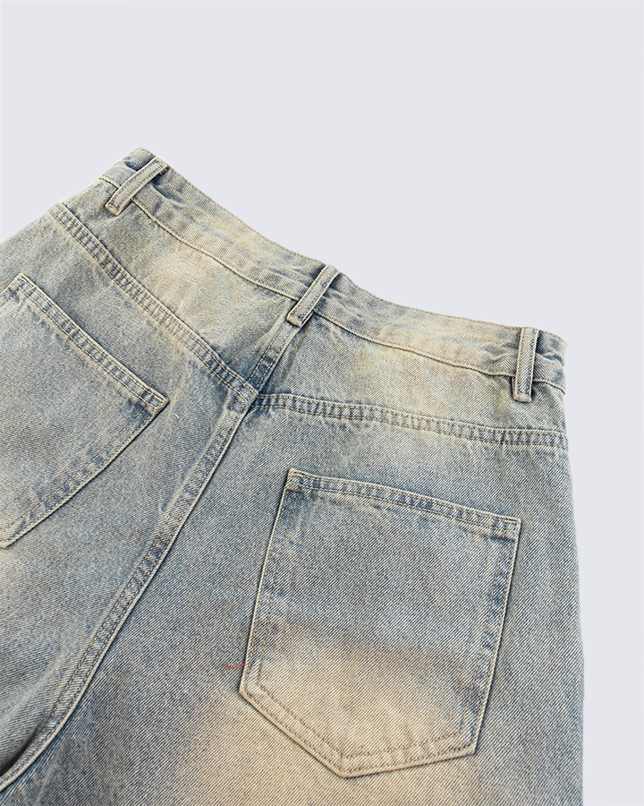 Wide-Leg Denim Jeans with Buttoned Hem